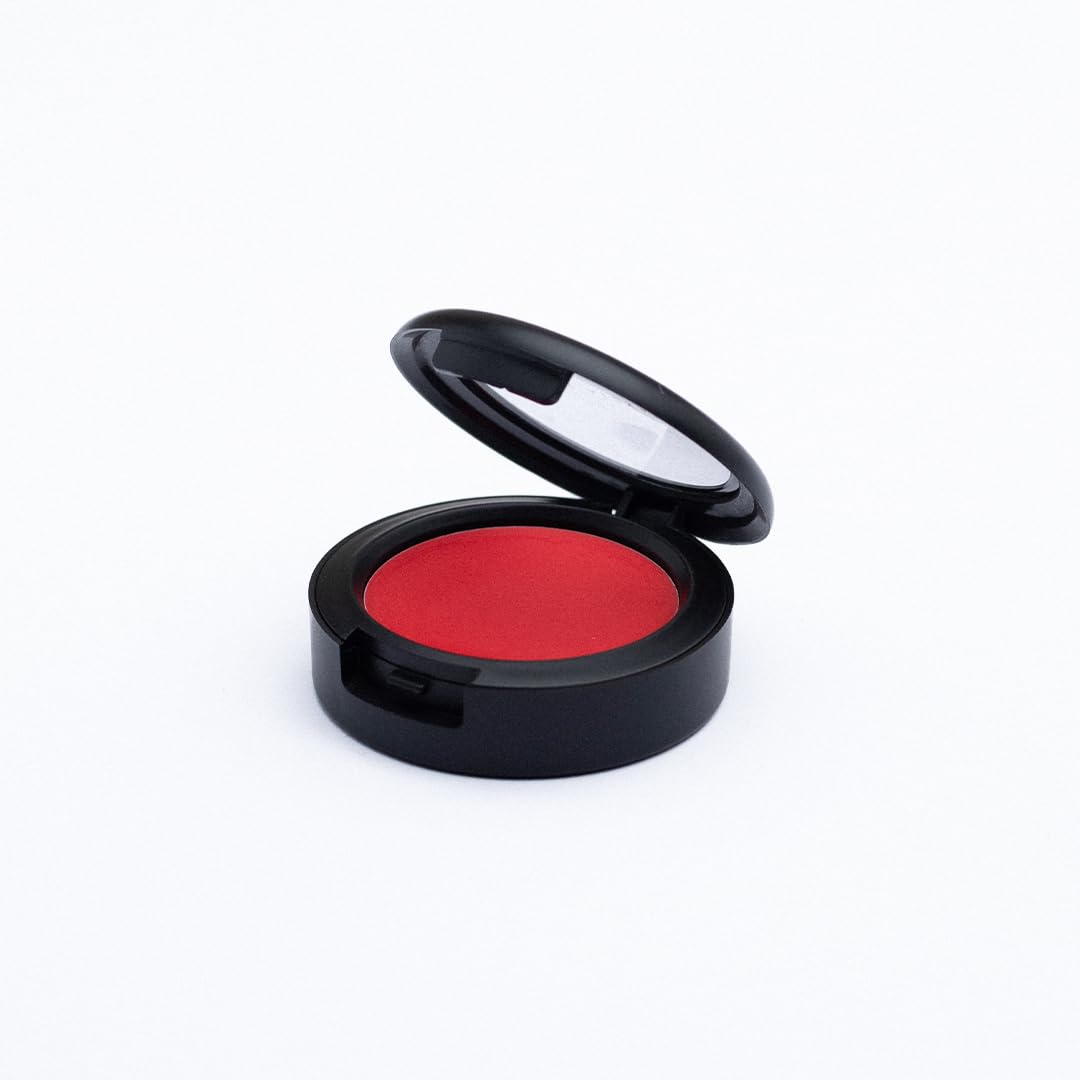 Jerome Alexander Blush 'n' Kiss Jam swatch shows vibrant cheek color