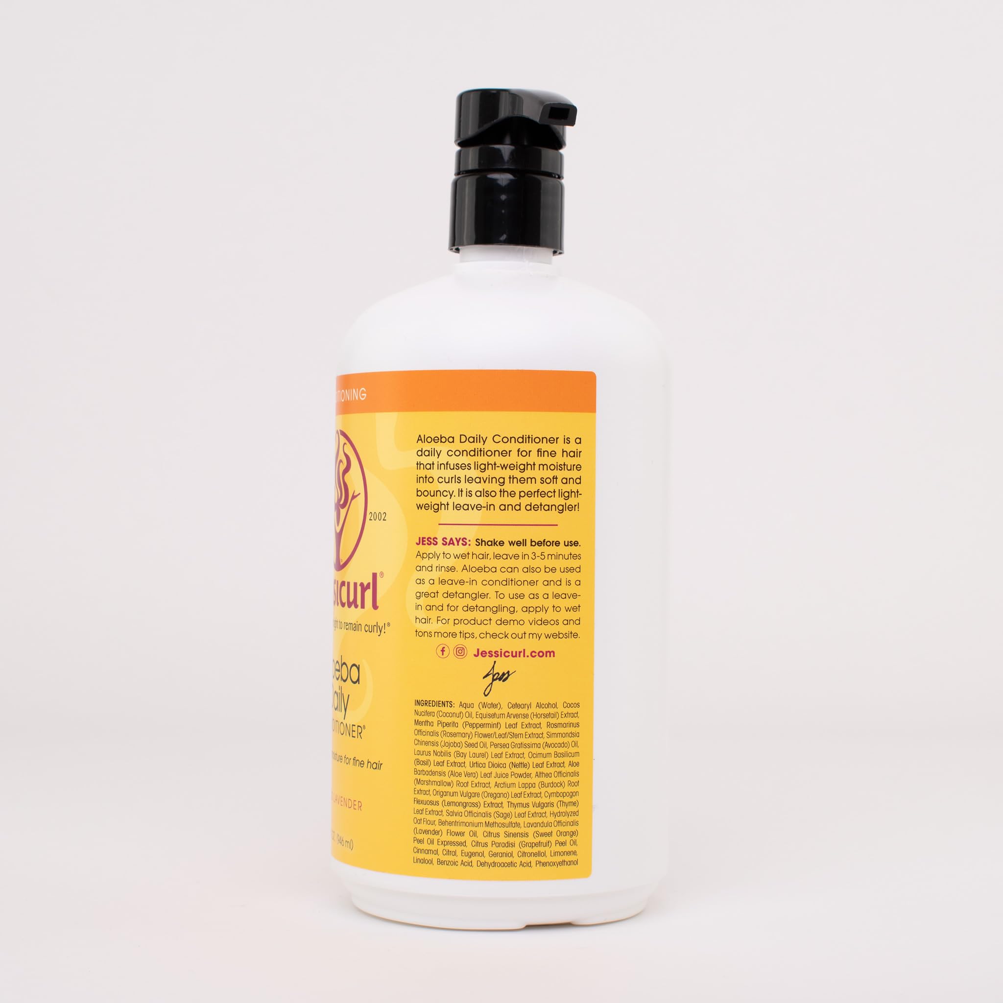 Applying Aloeba to damp hair to detangle and condition.