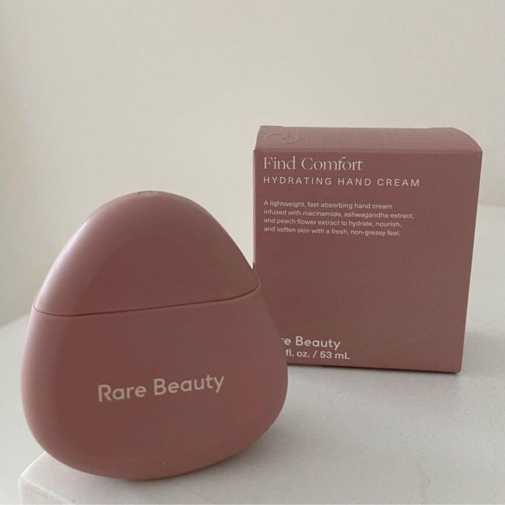 Travel-ready compact jar of JIGME CALA R.A.R.E Beauty Selena G hand cream.