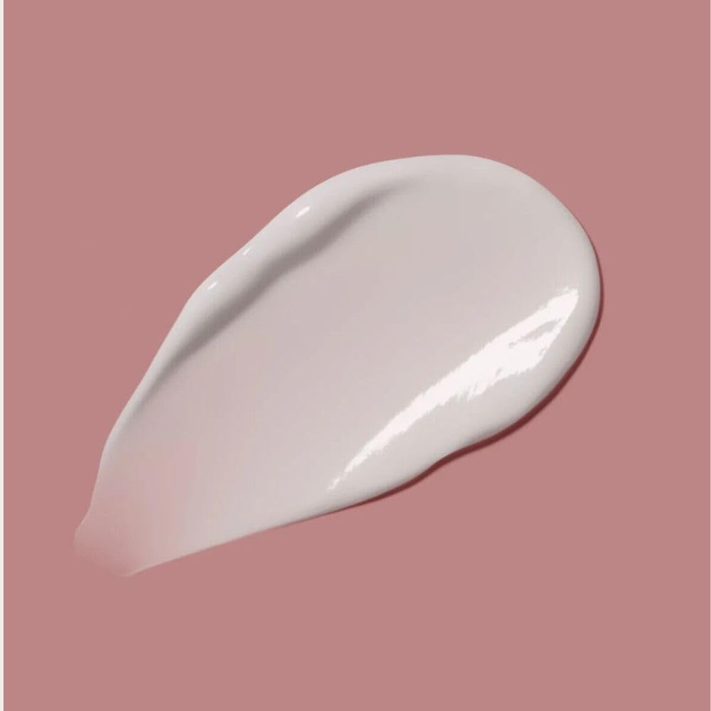 Texture closeup of JIGME CALA R.A.R.E Beauty Selena G hand cream.