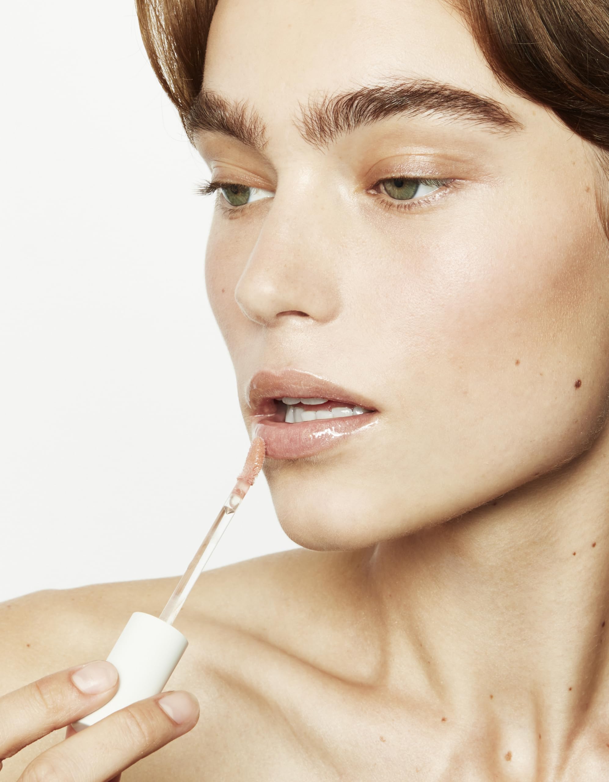 Jillian Dempsey Lip Gloss Bubble Pink shade may visually brighten teeth