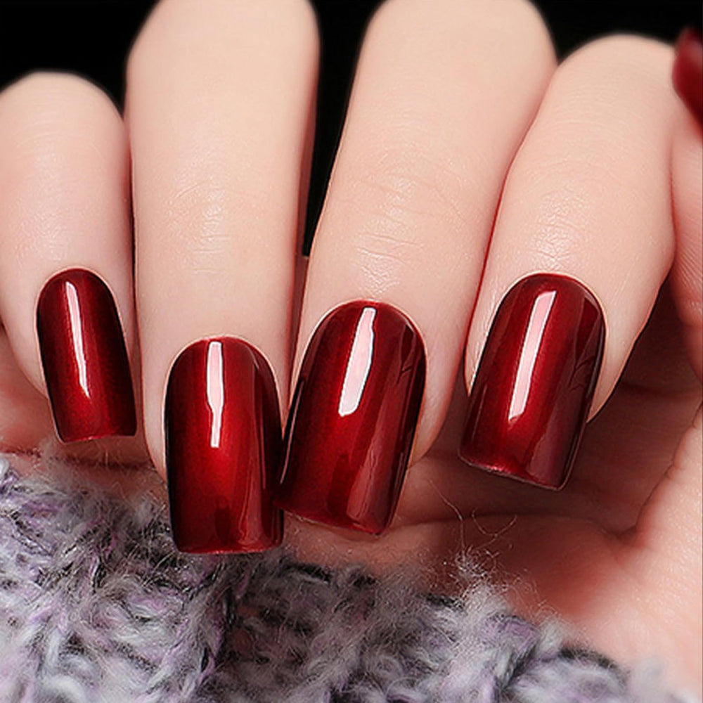 JimysCo COSMOO closeup highlights burgundy shimmer on nails.
