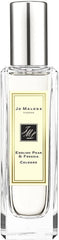 Jo Malone English Pear & Freesia spray application demonstrates easy use and lasting projection