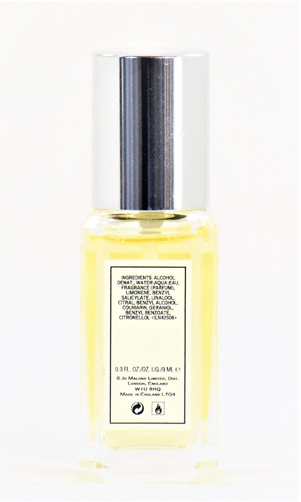 Close-up of Jo Malone Orange Bitters unboxed 0.3 oz bottle, citrus aroma in focus.