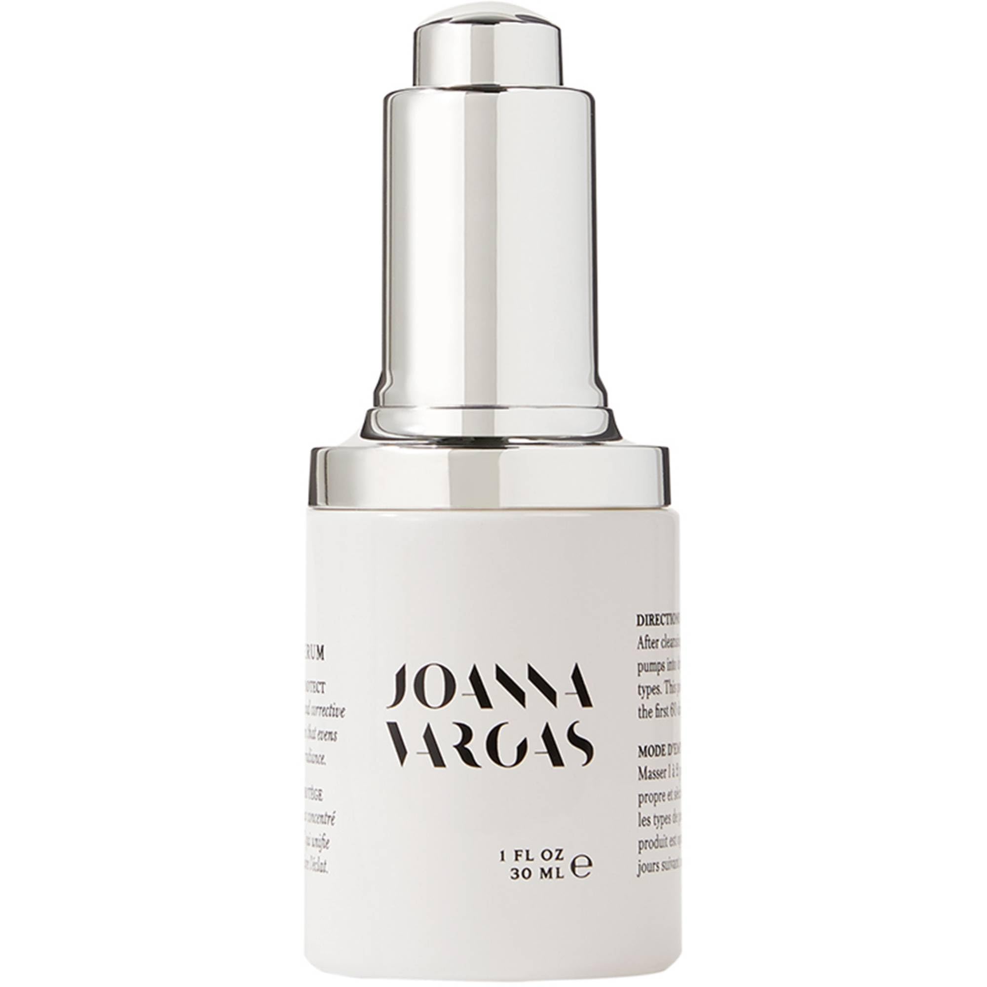 Serum on a vanity setup suggests daily luxury skincare ritual.