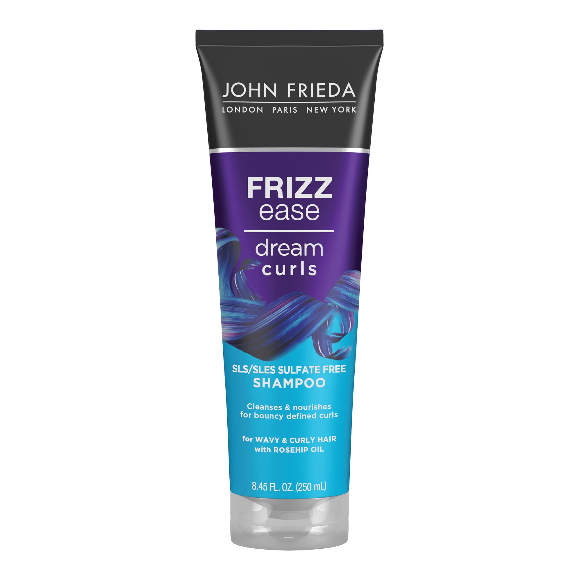 John Frieda Dream Curls Shampoo bottle shows sulfate-free formula for defined curls.