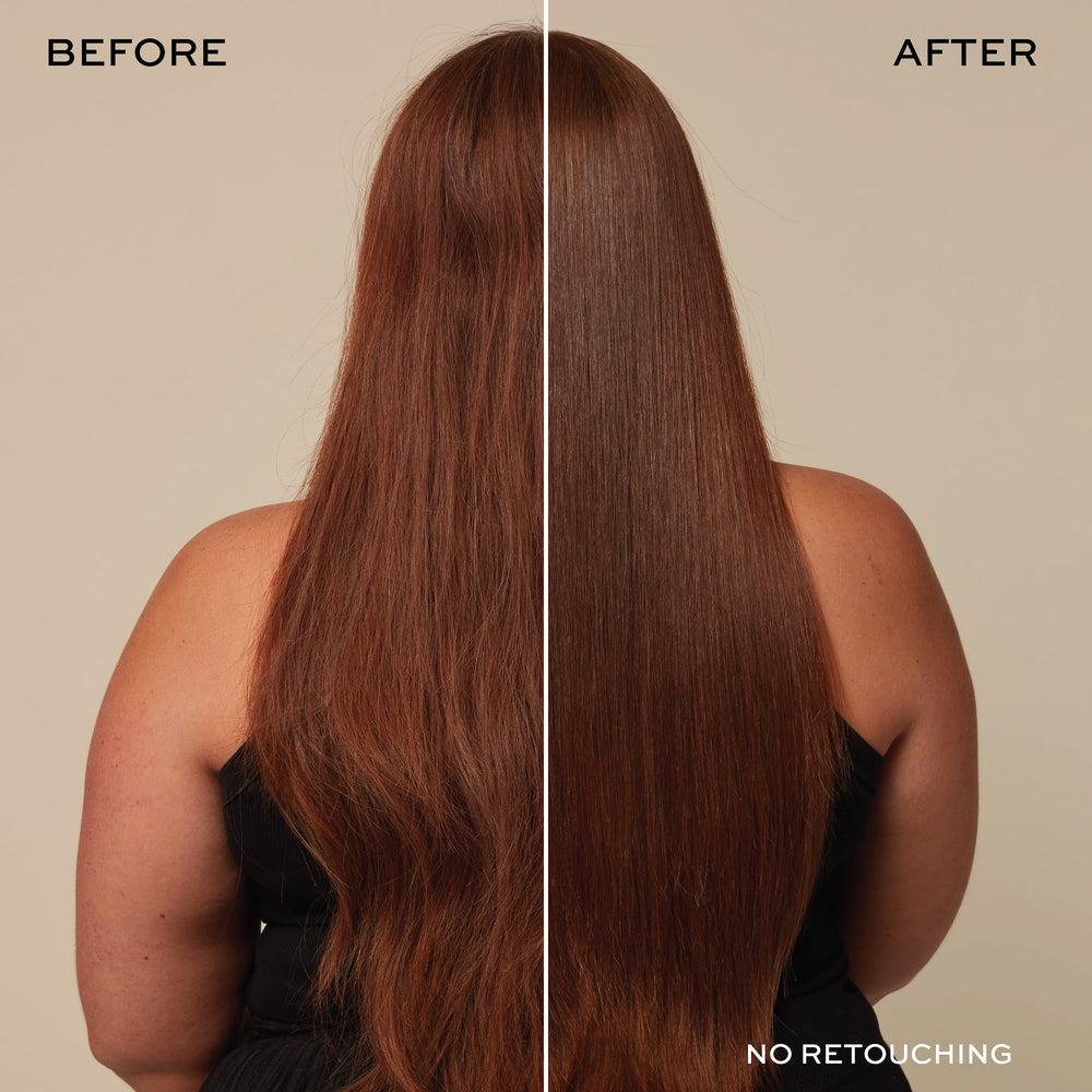 Damp hair being treated for even distribution.