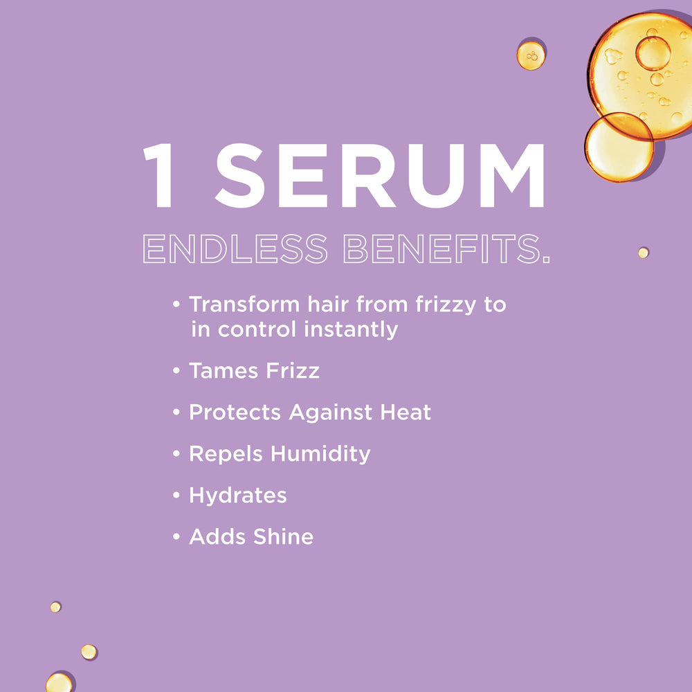 John Frieda Frizz Ease Original serum applied to hair for smoothing