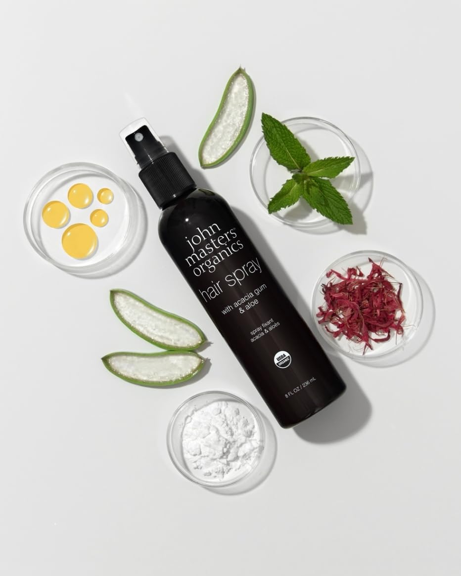 John Masters Organics Hair Spray I hair hold demonstrates flexible styling for all-day control.