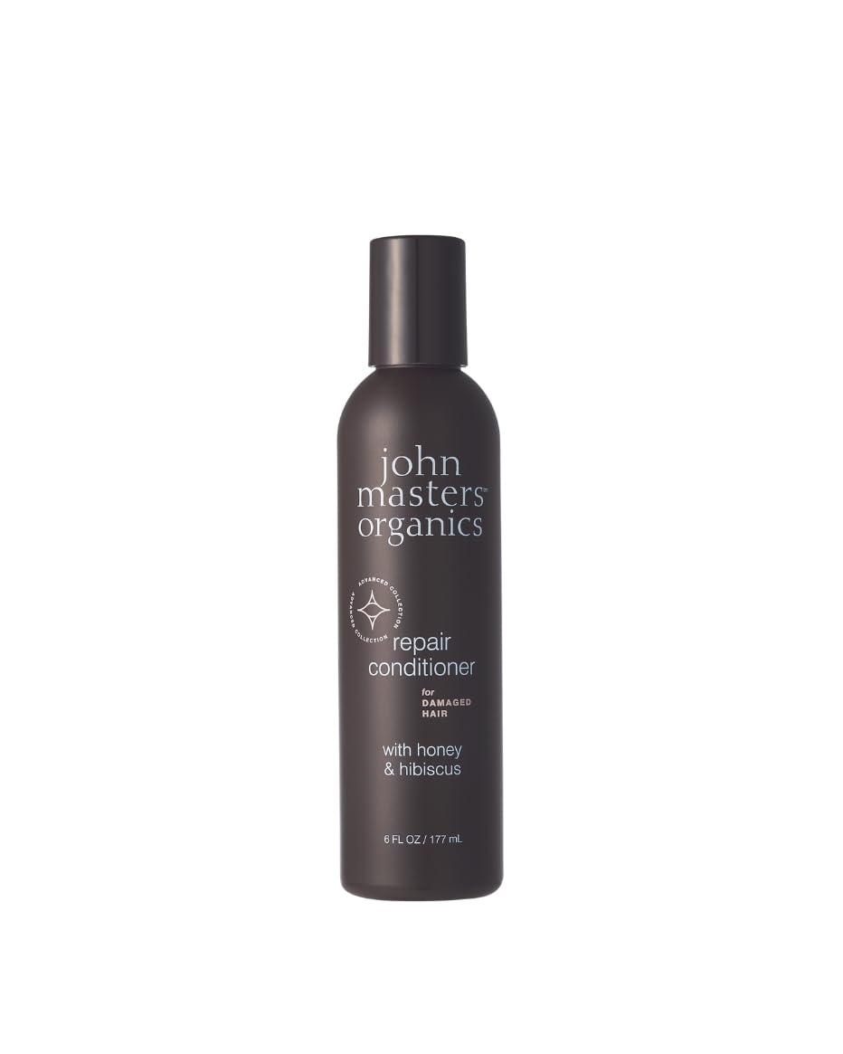 John Masters Organics Repair Conditioner bottle highlights silicone-free nourishment for damaged hair.