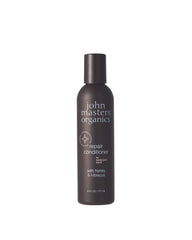 John Masters Organics Repair Conditioner bottle highlights silicone-free nourishment for damaged hair.