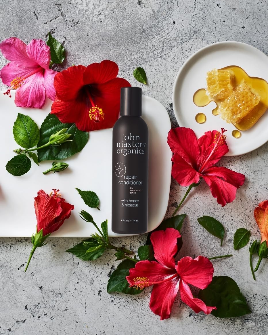 John Masters Organics Repair Conditioner label emphasizes organic ingredients and clean beauty benefits.