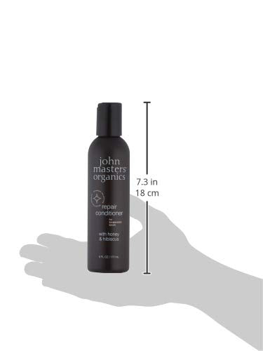 John Masters Organics Repair Conditioner texture close-up illustrates deep conditioning potential.