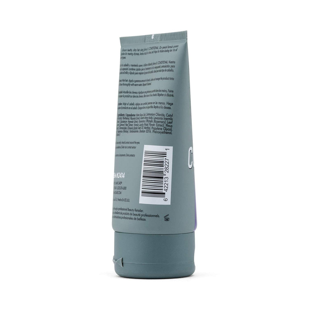 Johnny B. conditioner texture close-up shows lightweight formula for manageable hair