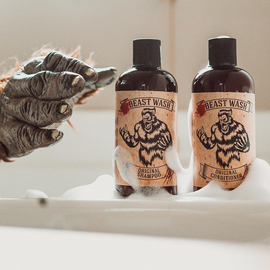 Johnny Slicks Conditioner application scene shows hands applying for soft, manageable hair.