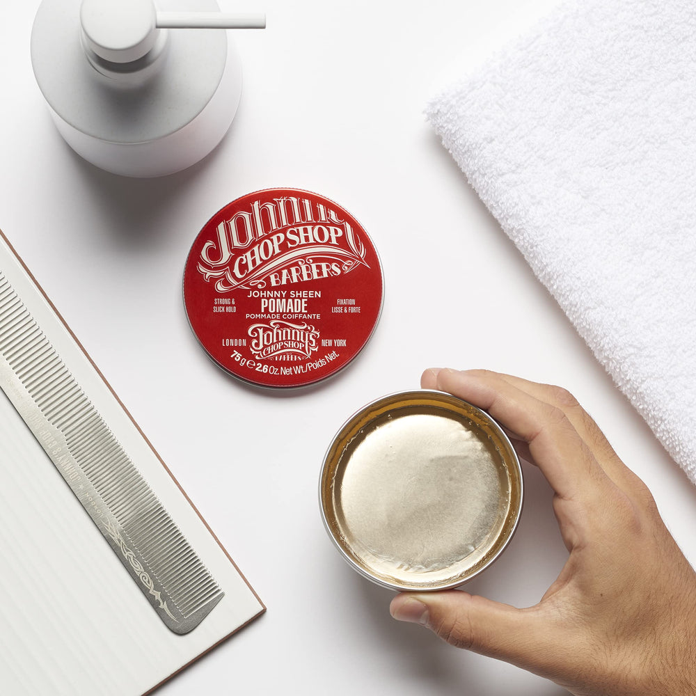 Johnny's Chop Shop hands applying pomade demonstrate easy application.