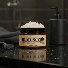 Texture close-up of exfoliating particles from Joli Noir Walnut Face Scrub.