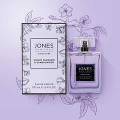 Jones New York Violet Blossom & Sandalwood bottle glows with plum hues for elegant evenings.