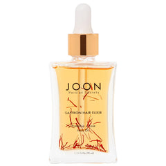 Joon Saffron Hair Elixir bottle ready to nourish and detangle.