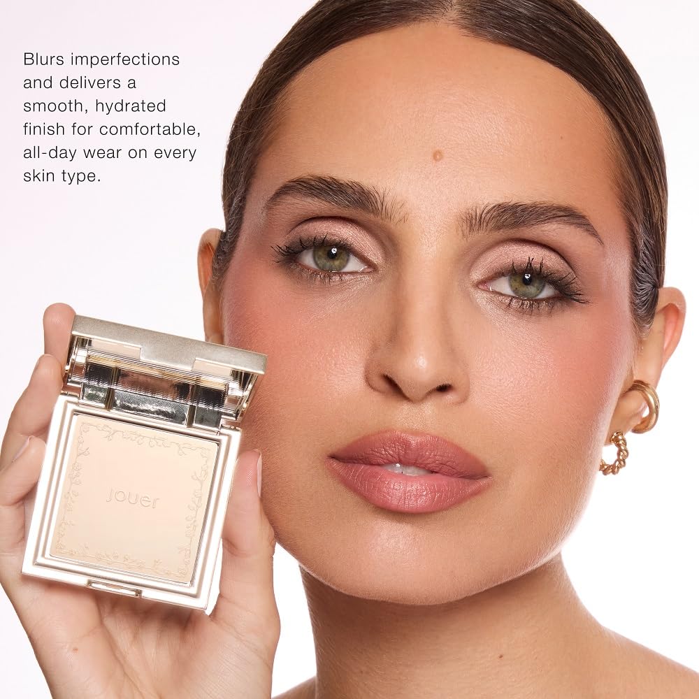 Model wear shows photo-ready, even complexion with Jouer powder.