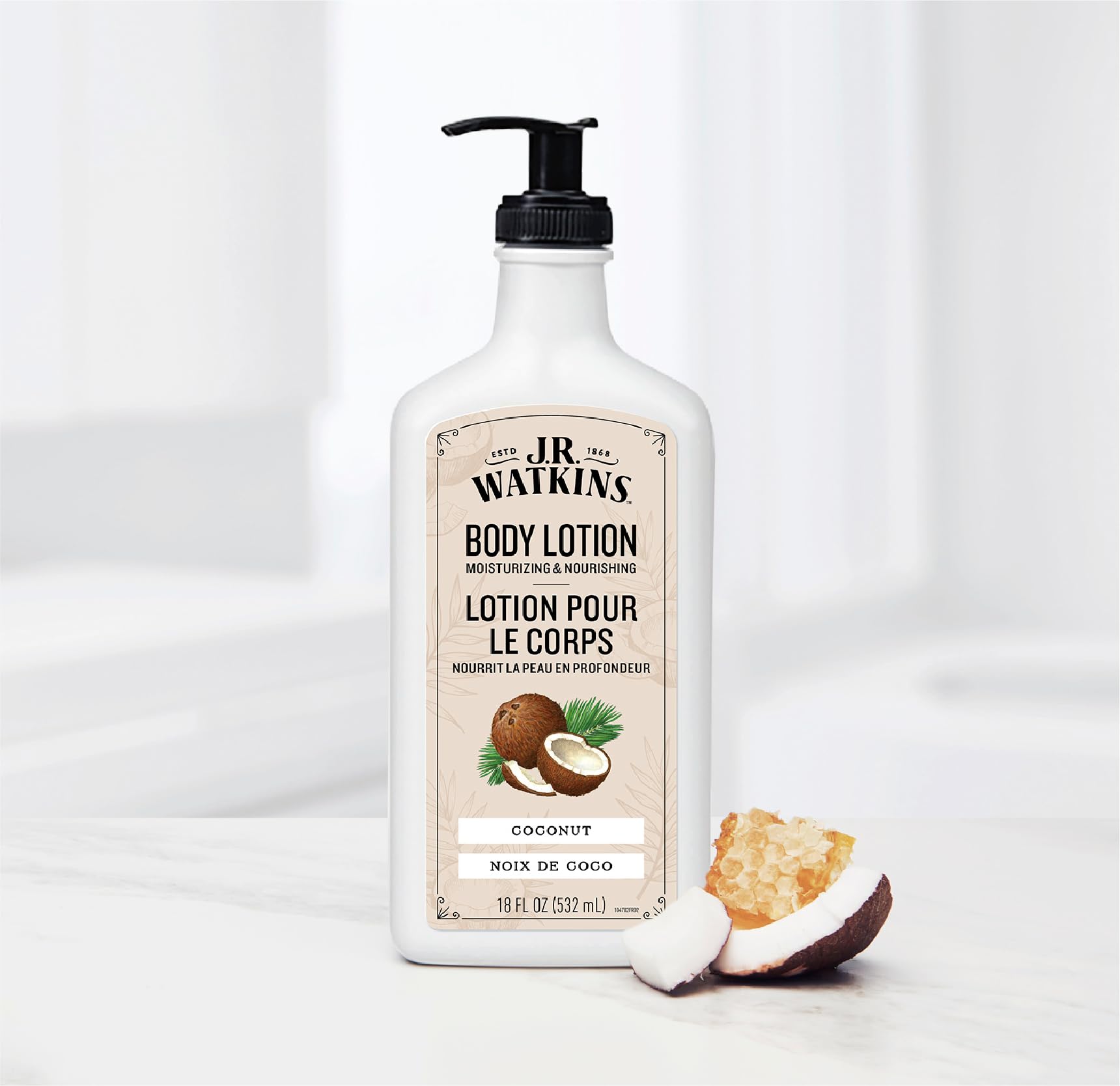JR Watkins coconut lotion texture close-up highlights quick-absorption.