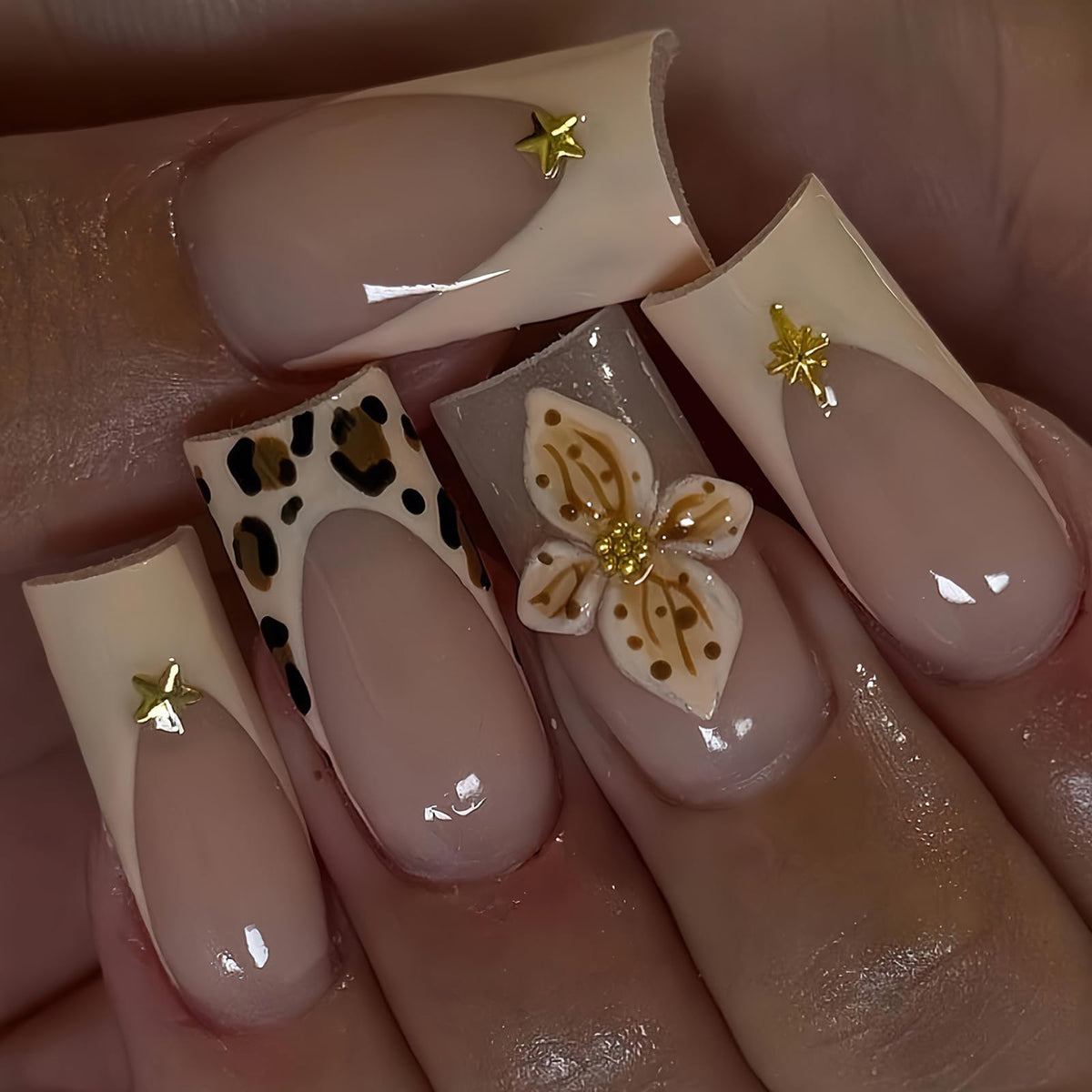 Jremg cheetah French tip nails for stylish on-the-go manicure.