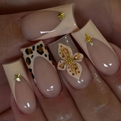 Jremg cheetah French tip nails for stylish on-the-go manicure.