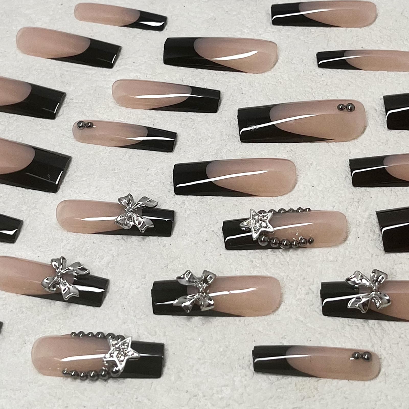 Jremg press-on nails showing the 12 sizes for a snug fit