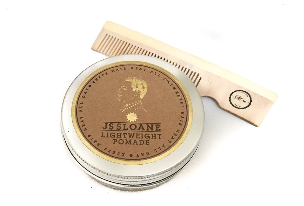 JS Sloane Lightweight Pomade in hand, showing smooth shine and flexible hold for daily styling.