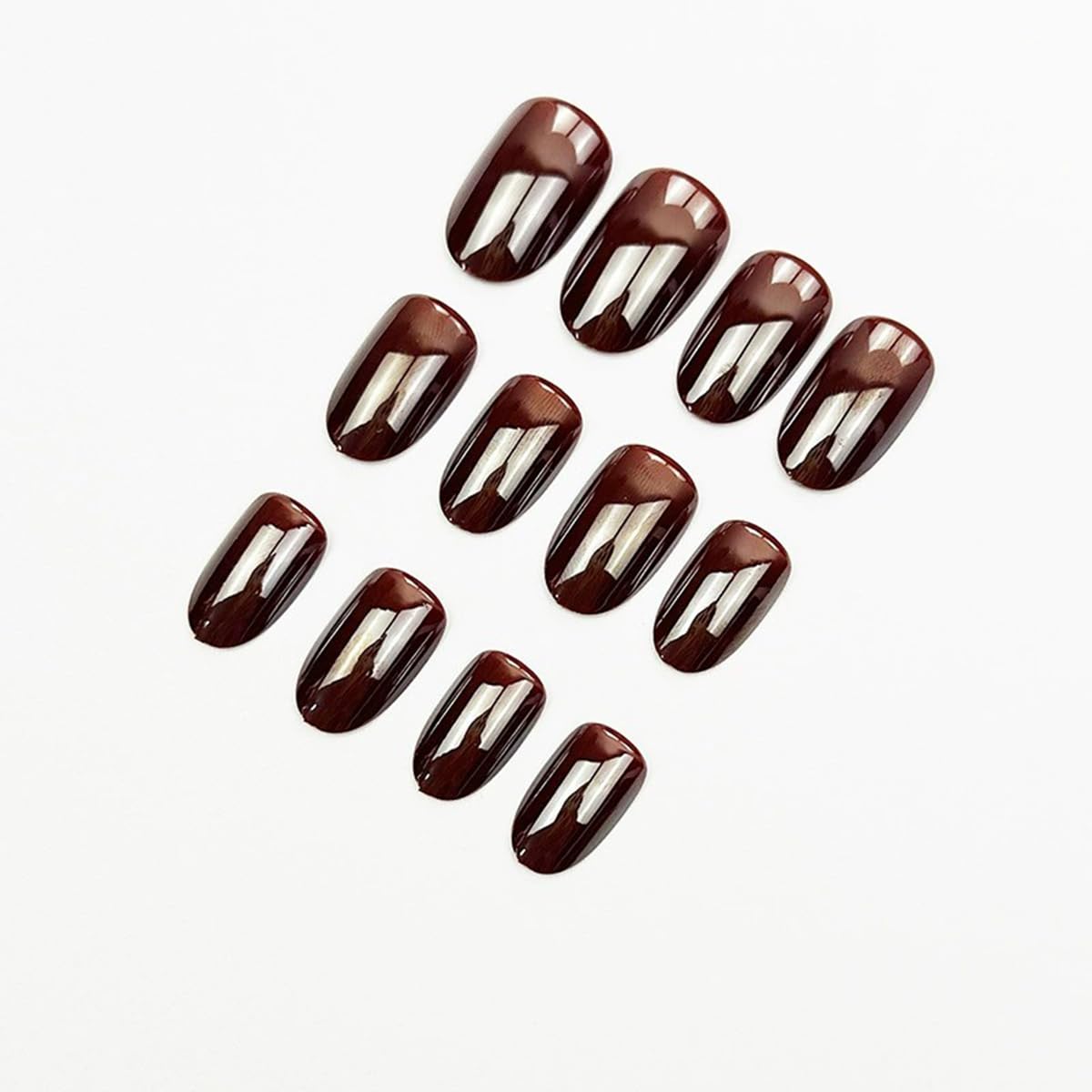 juggssa coffee brown nails on fingers show elegant almond shape