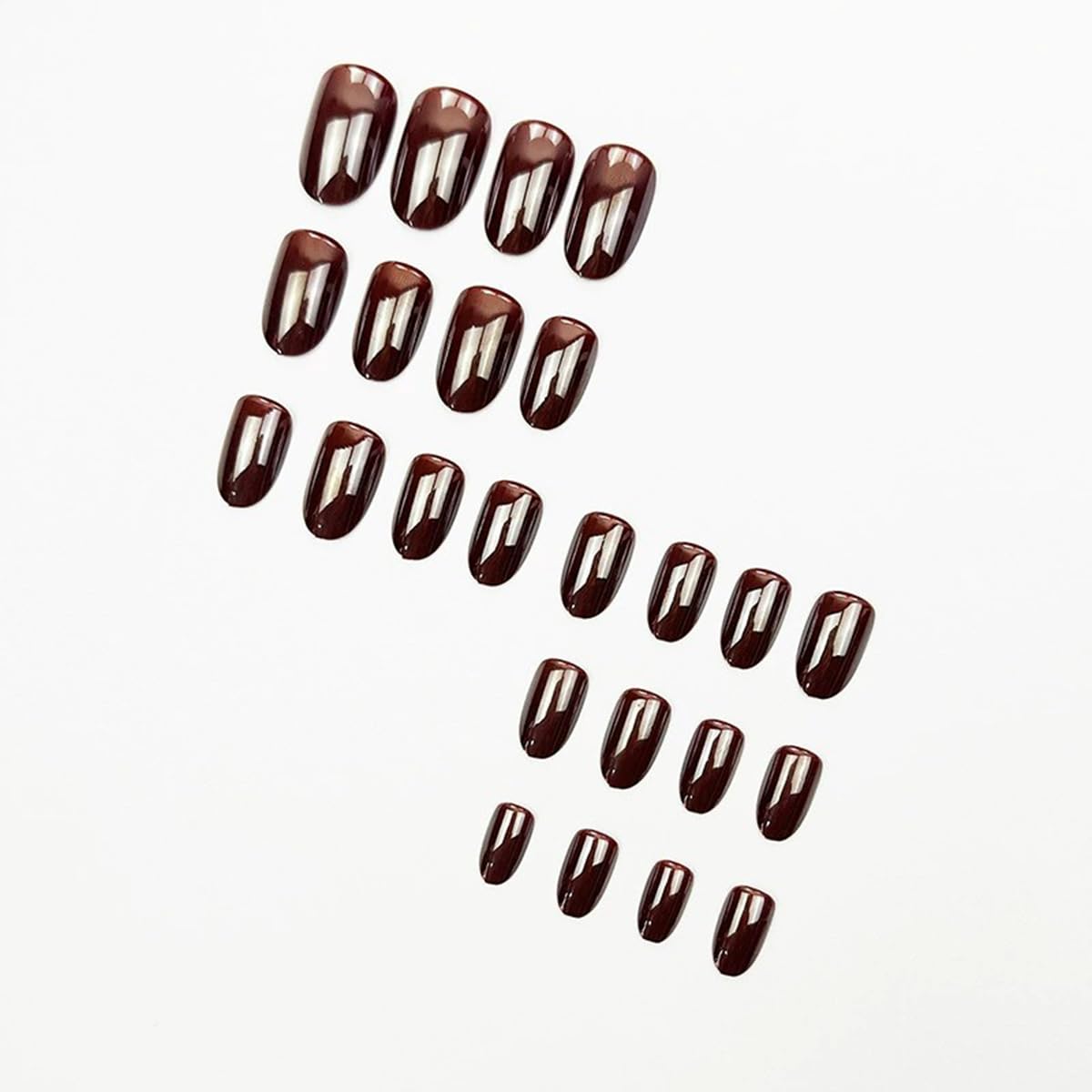 close up juggssa coffee brown oval nails with natural finish