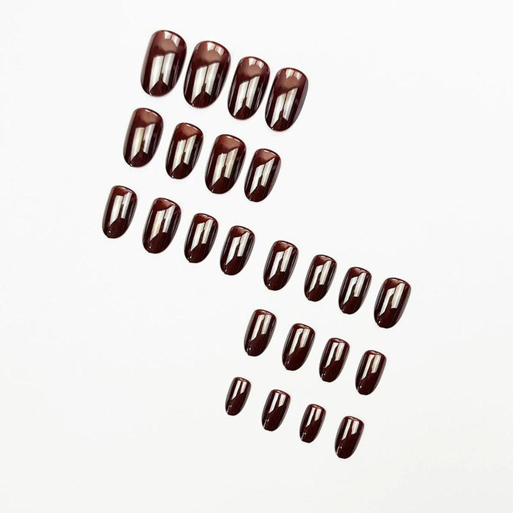 close up juggssa coffee brown oval nails with natural finish