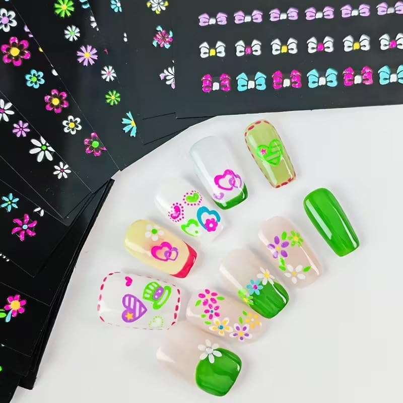 Juggssa butterfly and bow motifs elevate festive nails