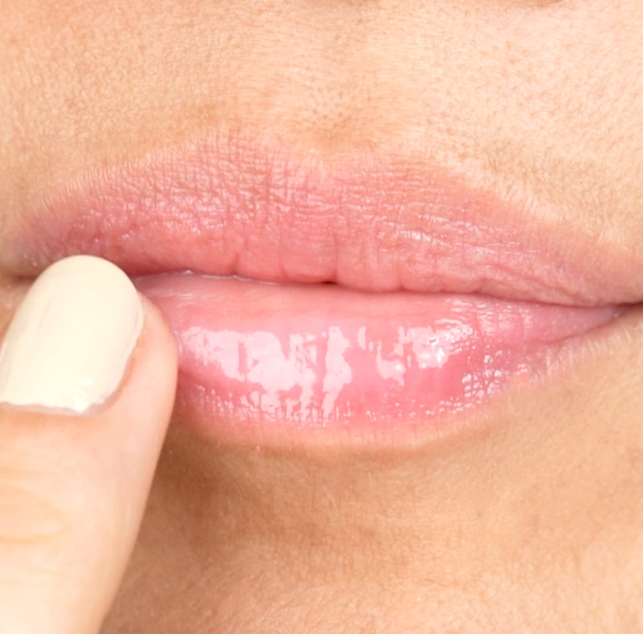 Close-up shows Julep lip treatment tube applying evenly.