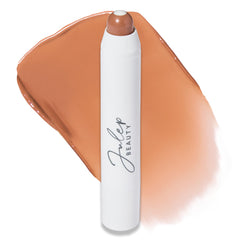Julep It's Balm Tint Almond Nude lip balm close-up, creamy texture for everyday hydration.