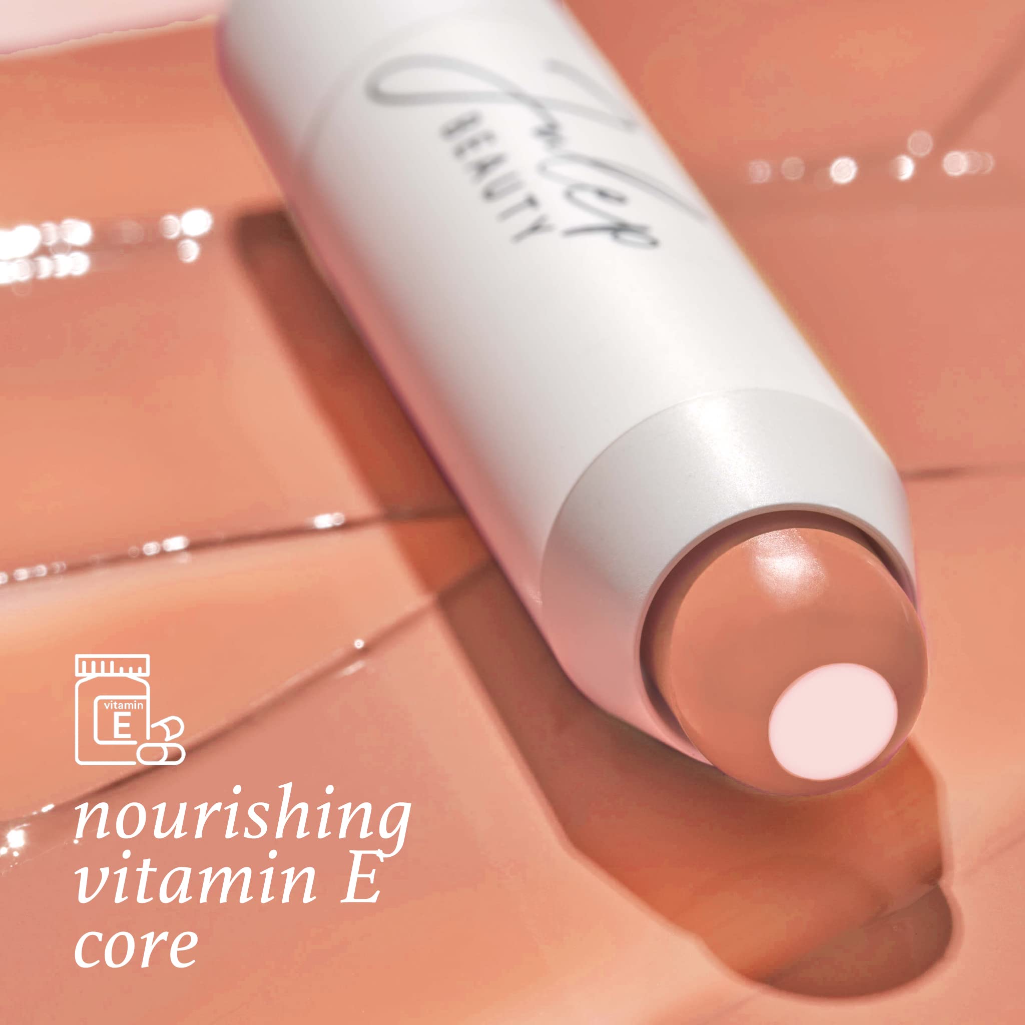 Julep almond nude shade applied on lips showing sheer color.
