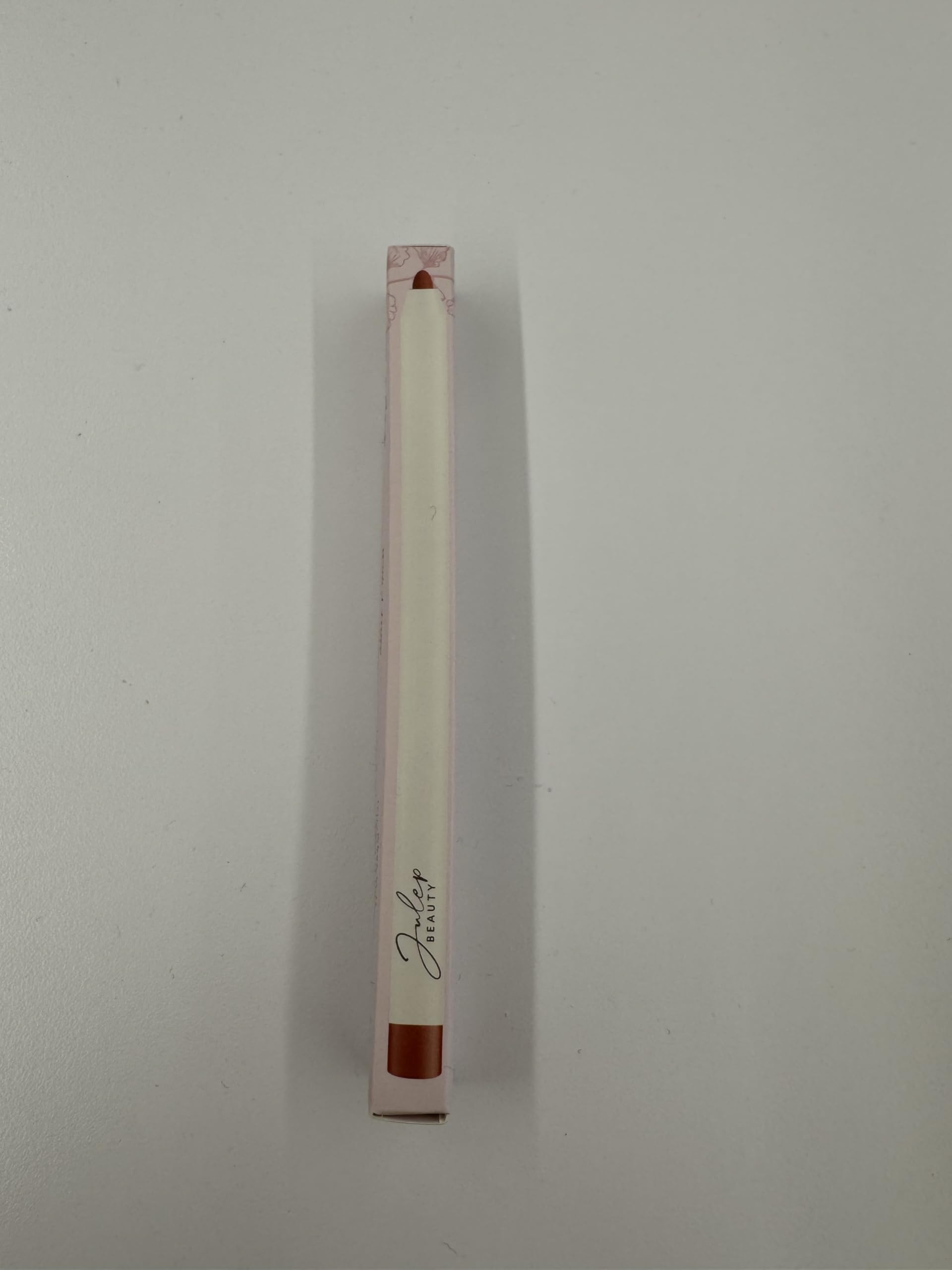 Julep lip liner in a sleek retractable container with twist mechanism