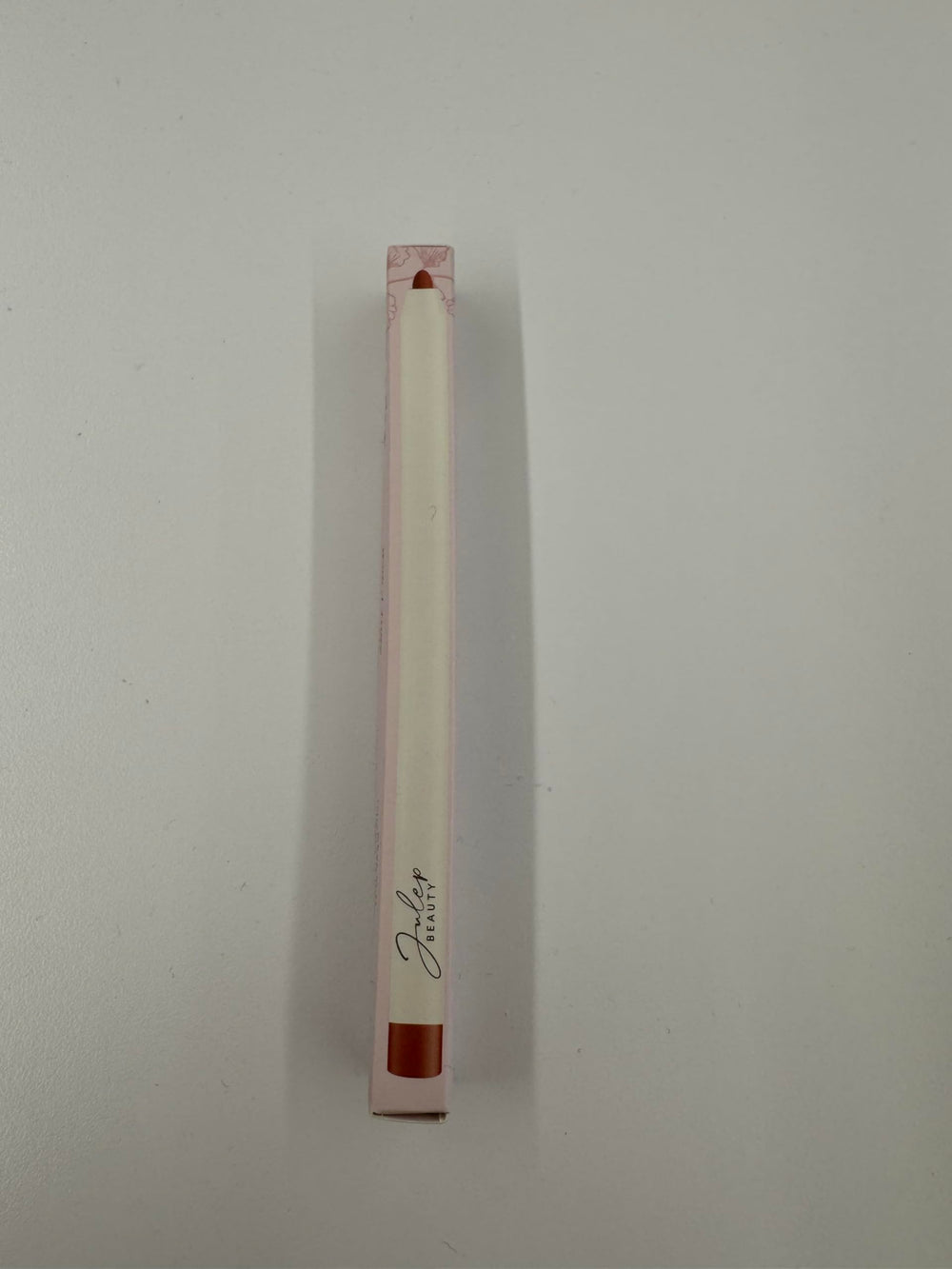 Julep lip liner in a sleek retractable container with twist mechanism