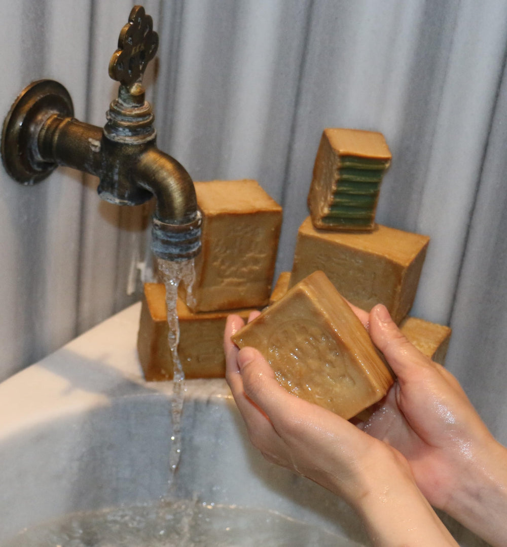 JUSIZA Aleppo soap traditional production image emphasizing artisanal craftsmanship.