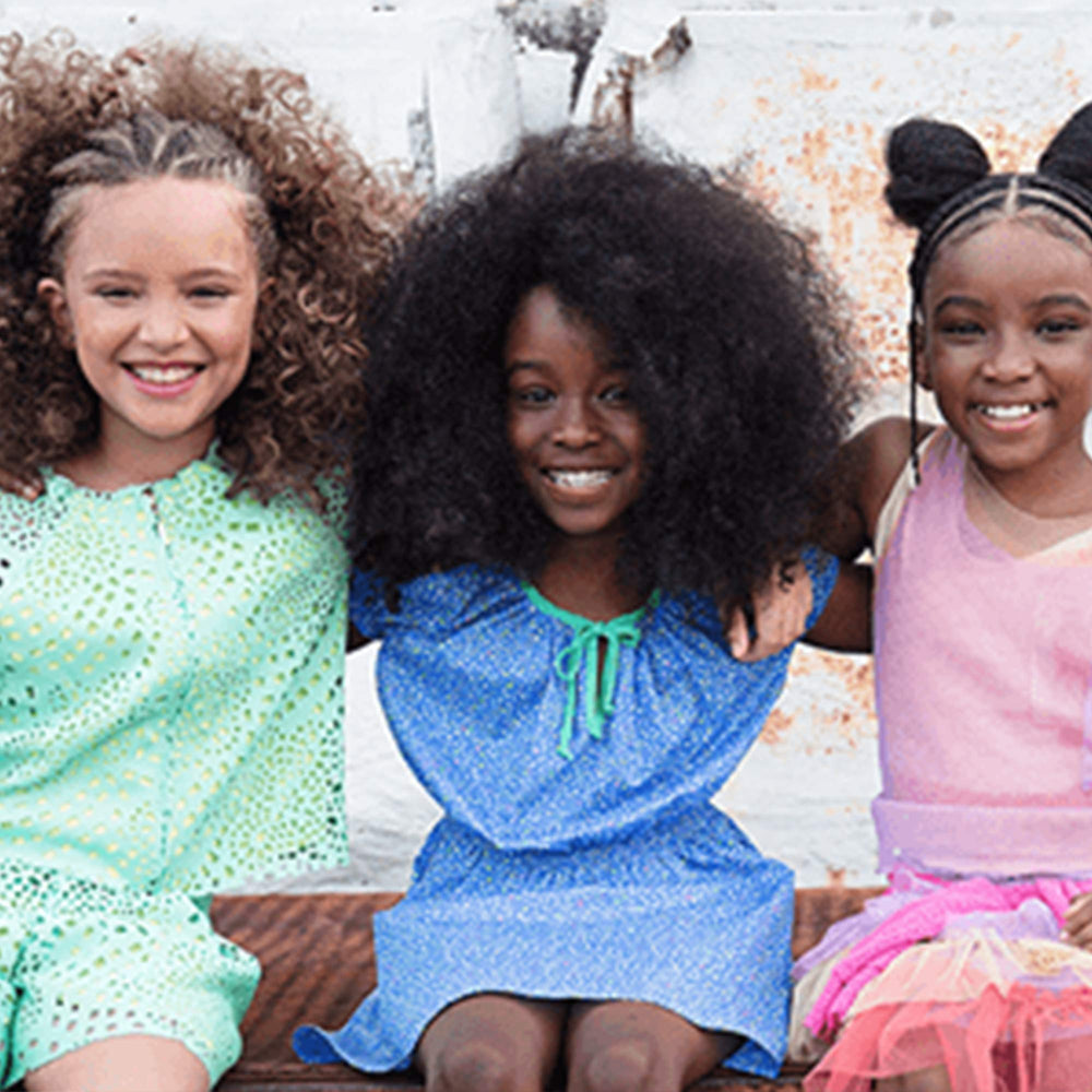 Just For Me Hair Milk Oil on textured hair demonstrates lightweight hydration and manageability