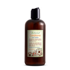 Just Nutritive hair loss conditioner bottle showing nourishing formula for healthier-looking strands.