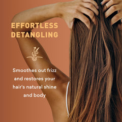 Just Nutritive Leave-In Shine Boost adds natural, radiant luster.