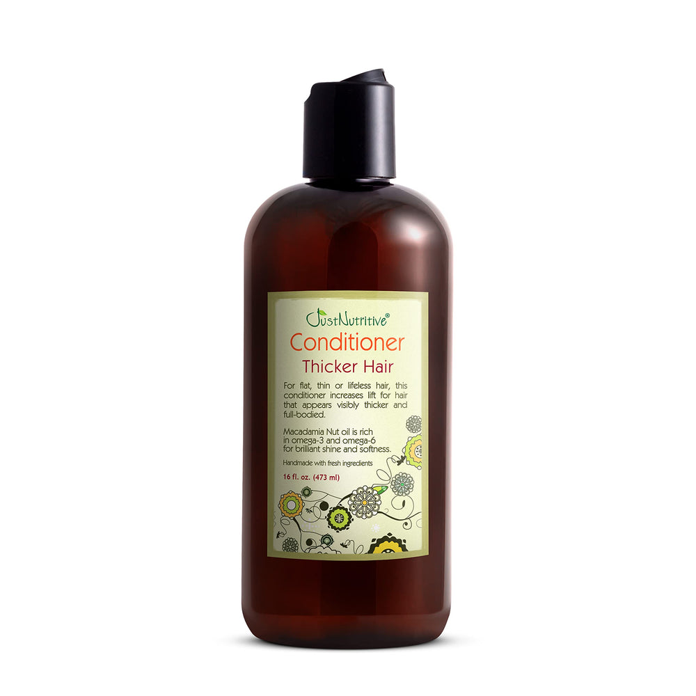 Just Nutritive Thicker Hair Conditioner bottle-pour showing rich, silky texture.