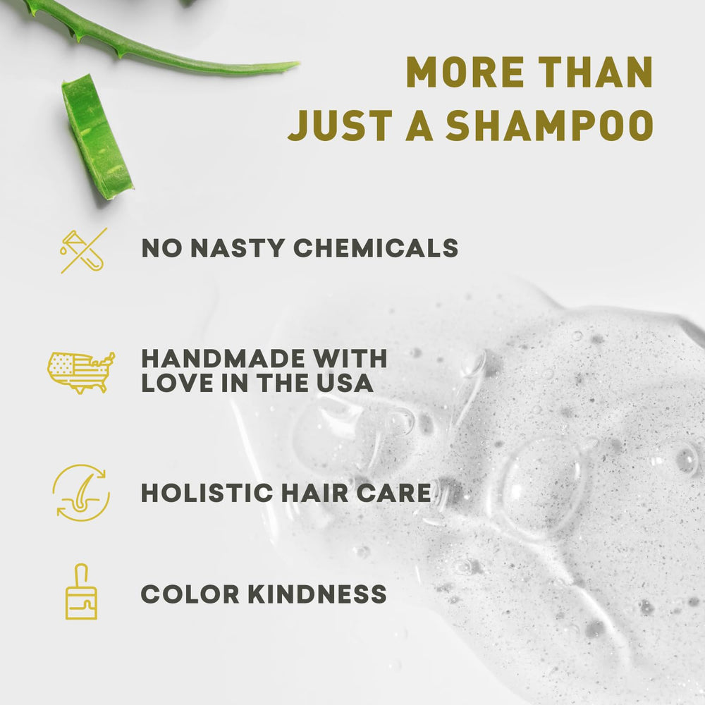 Hands massaging shampoo into scalp to remove buildup