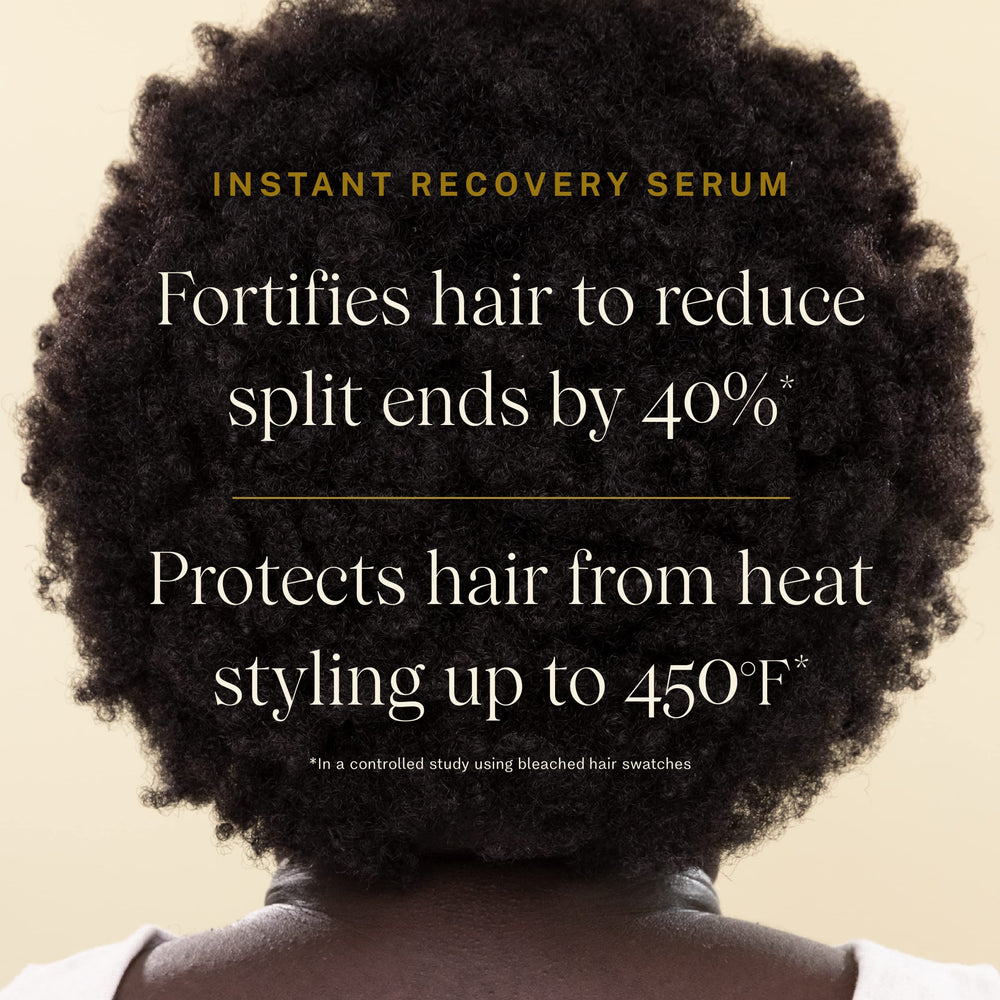 Hands applying JVN serum to mid‑lengths and ends for smoothing.
