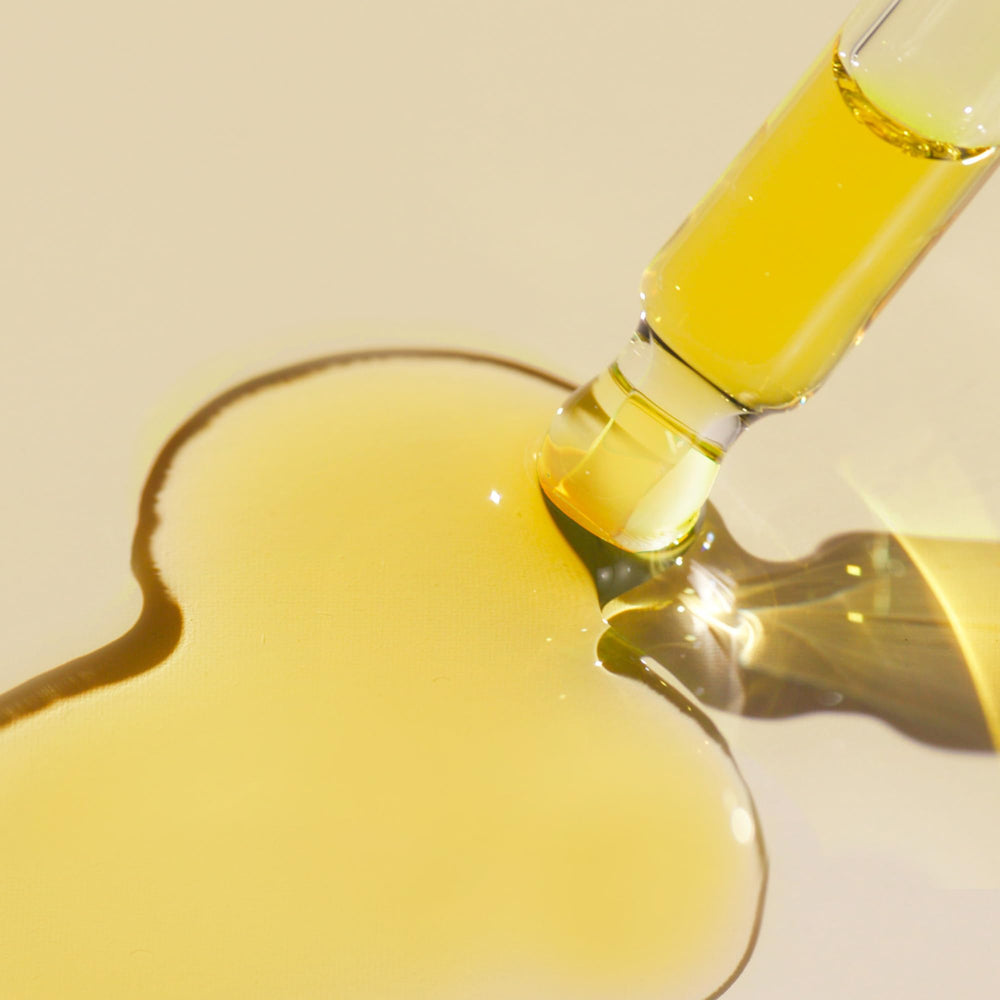 JVN pre-wash oil image shows a clear bottle used to nourish and clarify scalp.