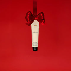 JVN No Heat Air Dry Cream in hand demonstrates easy distribution for natural texture