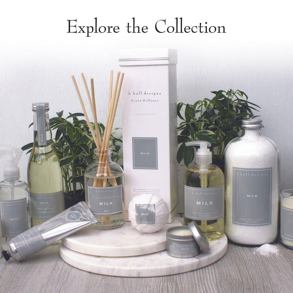 K. Hall Designs Milk packaging in a bathroom setting emphasizes eco-friendly materials.