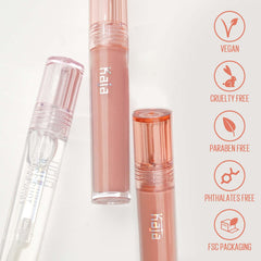 Kaja Gloss Shot 03 Honey Drizzle applying on lips for instant hydration and gloss.