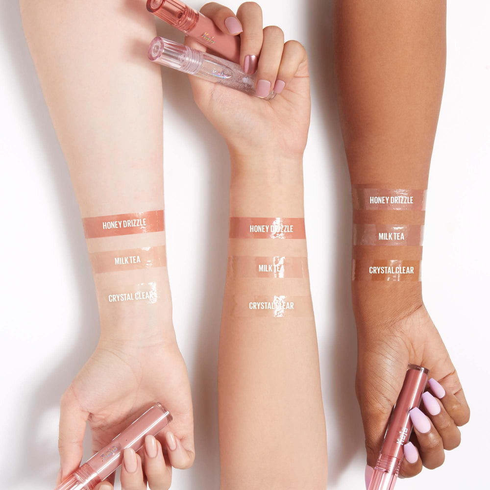 Kaja Gloss Shot 03 Honey Drizzle sheer color with pearls for subtle glow.